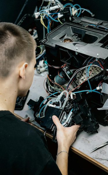 Voorbeeldfoto van een koffiemachine-reparatiewerkplaats